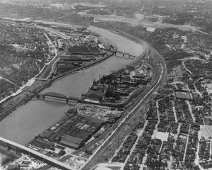 Historical aerial photo of Carrie and Homestead with the river and bridges