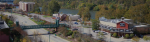 Aerial shot of Waterfront with pedestrian bridge in foreground