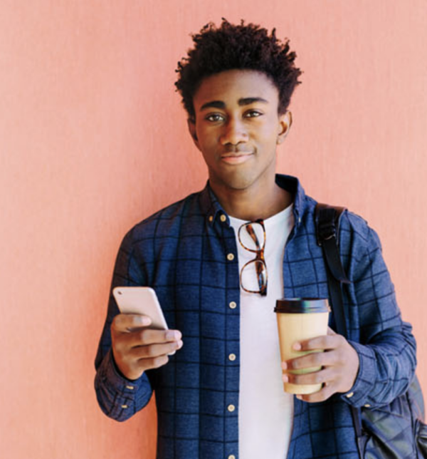 Young Black Student Using His Phone