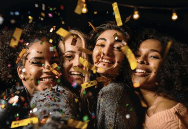 Girls with party streamers