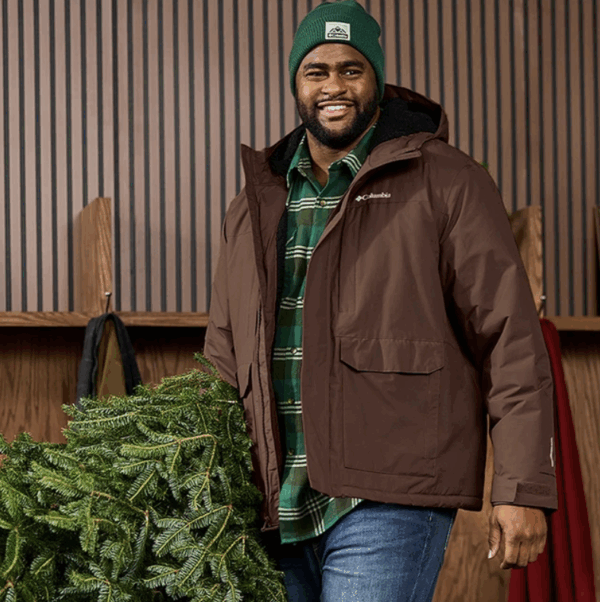 Man carrying Xmas Tree